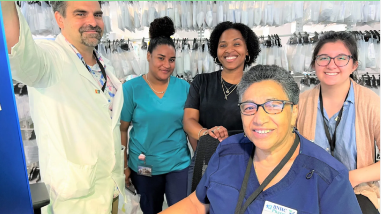 Brockton Neighborhood Health Center Pharmacy staff in will-call area